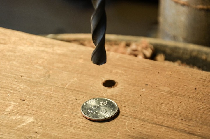 Designer Drills Holes Into Coins Turning Them Into Rings