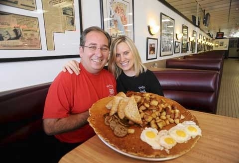 "The Terminator", Shelby's Kitchen and Deli.24-inch pancake, 4 fried eggs,6 sausage patties, 1 and a half pounds of bacon and home fries, and 2 slices of toast. Prize: 1 free meal