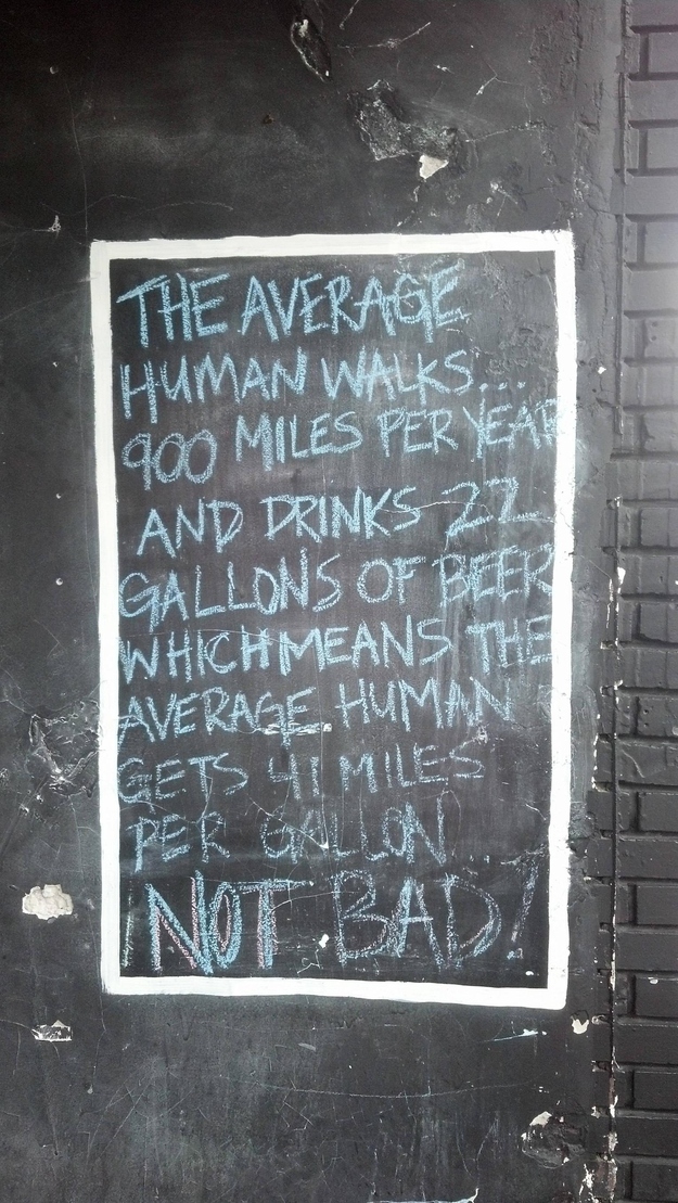 funny chalkboard beer signs - The Average Human Walks... 900 Miles Per Yeart And Drinks 22 Gallons Of Beer Which Means The Average. Human Cets 41 Miles Per Galon I NotBad!