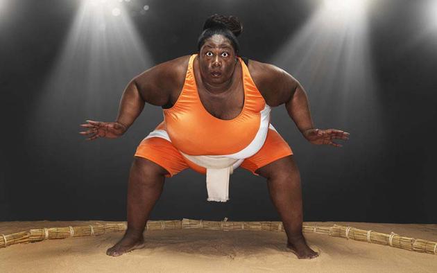 The heaviest athlete is Sharran Alexander of London. She is a sumo wrestler and her weight is 203.21kg 448lb.