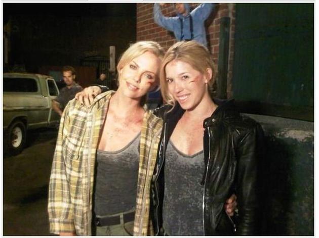 Charlize Theron and her Stunt Double. While filming the music video for Crossfire by Brandon Flowers.