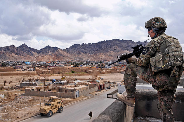 U.S. Army 1st Lt. Robert Wolfe provides rooftop security during a meeting in Farah City, Afghanistan, Feb. 25, 2013. Wolfe, a platoon leader, is assigned to Provincial Reconstruction Team Farah. U.S.