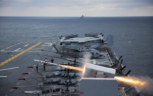 The amphibious assault ship USS Kearsarge LHD 3 fires a Rolling Airframe Missile RAM during a live-fire exercise. Kearsarge is conducting amphibious squadronMarine expeditionary unit integration in preparation for a scheduled deployment this spring.