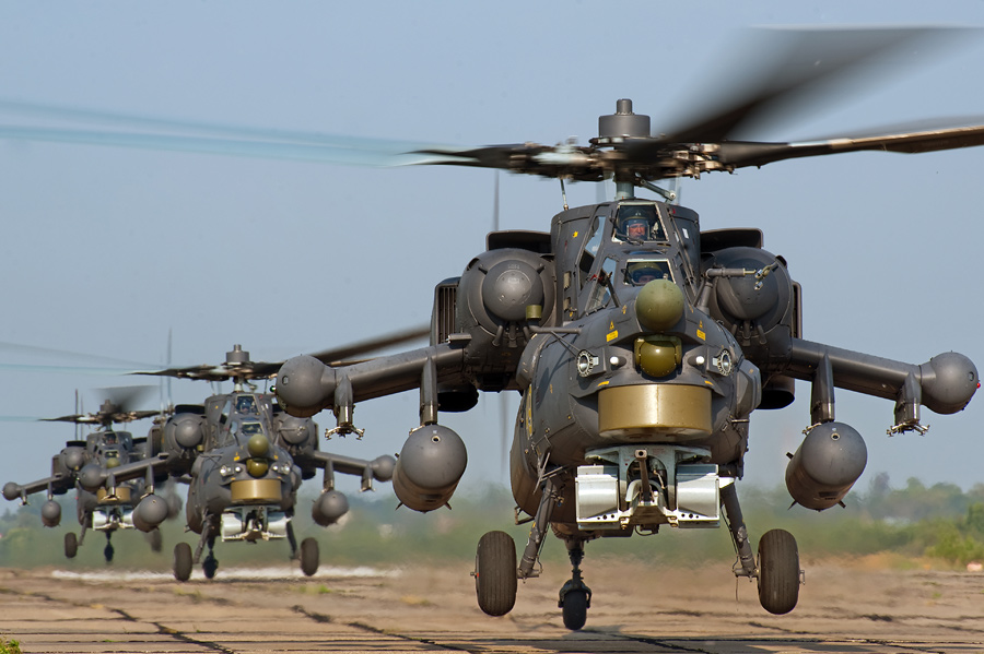 A lineup of Mi-28 anti-armour helicopters.
