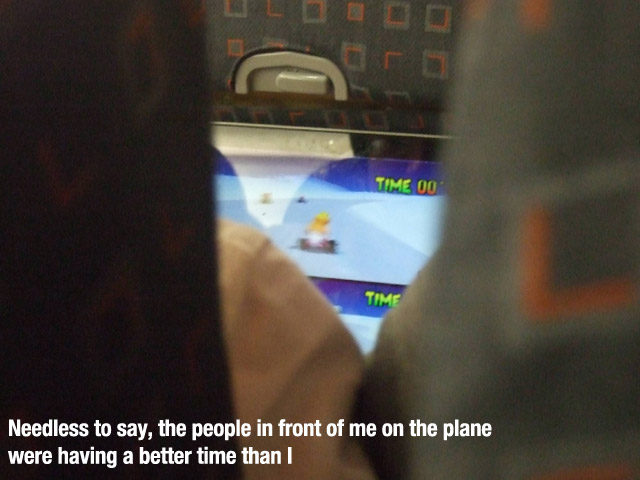 Gamer - Time 00 Needless to say, the people in front of me on the plane were having a better time than I