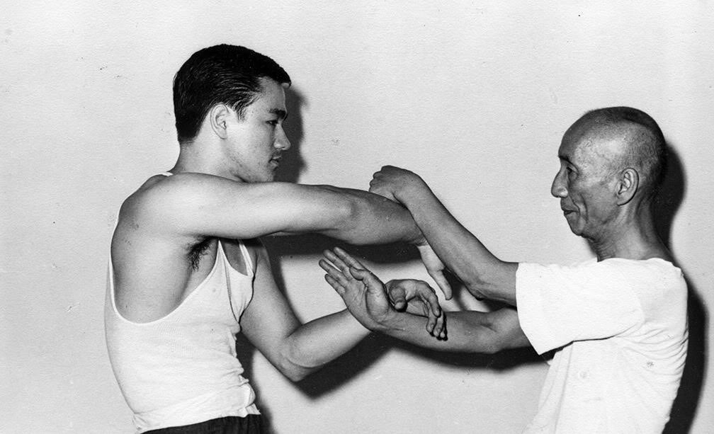 Bruce Lee sparring with Ip Man, 1955