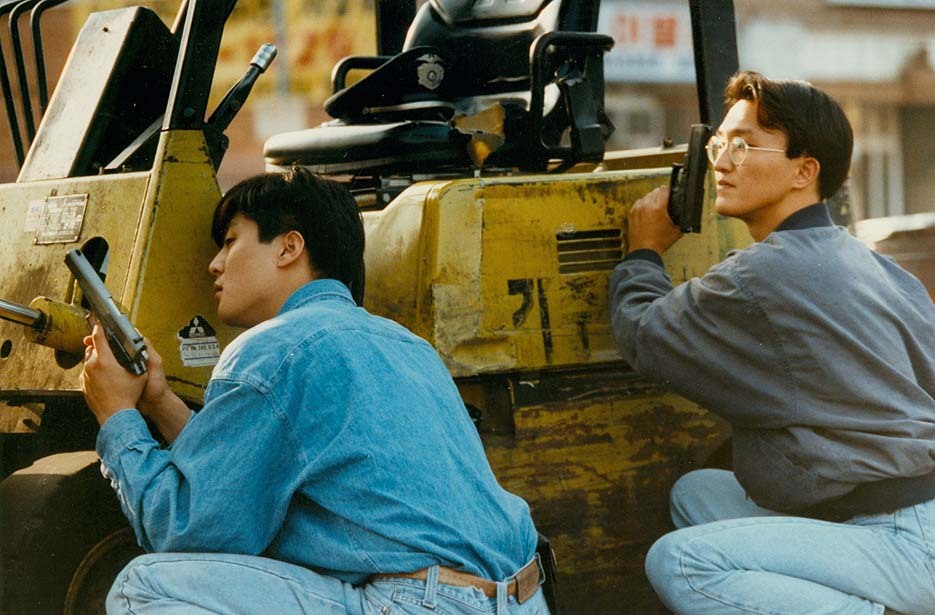 April 30, 1992 store owners arm themselves to defend their stores in Koreatown, LA at Western Ave and 5th St during the 1992 LA Riots.