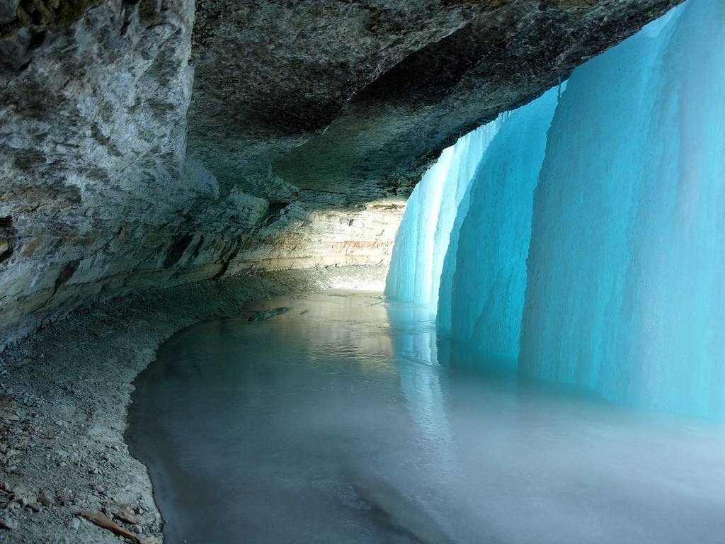 Behind a frozen waterfall