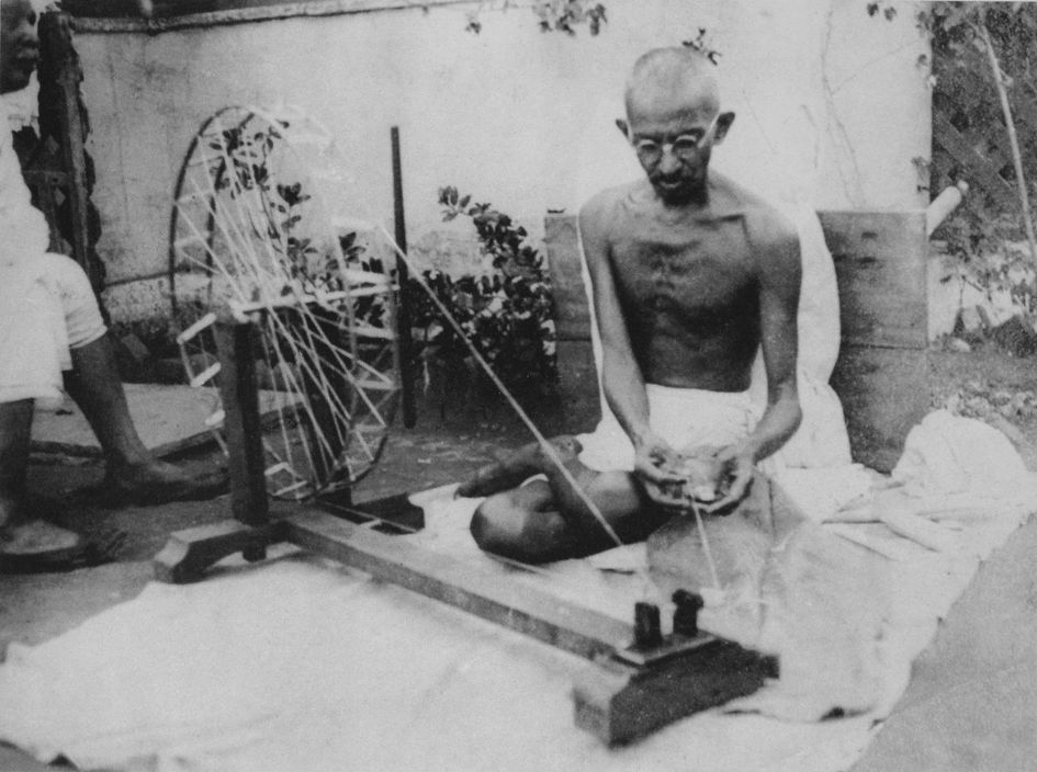 Mahatma Ghandi spinning yearn.