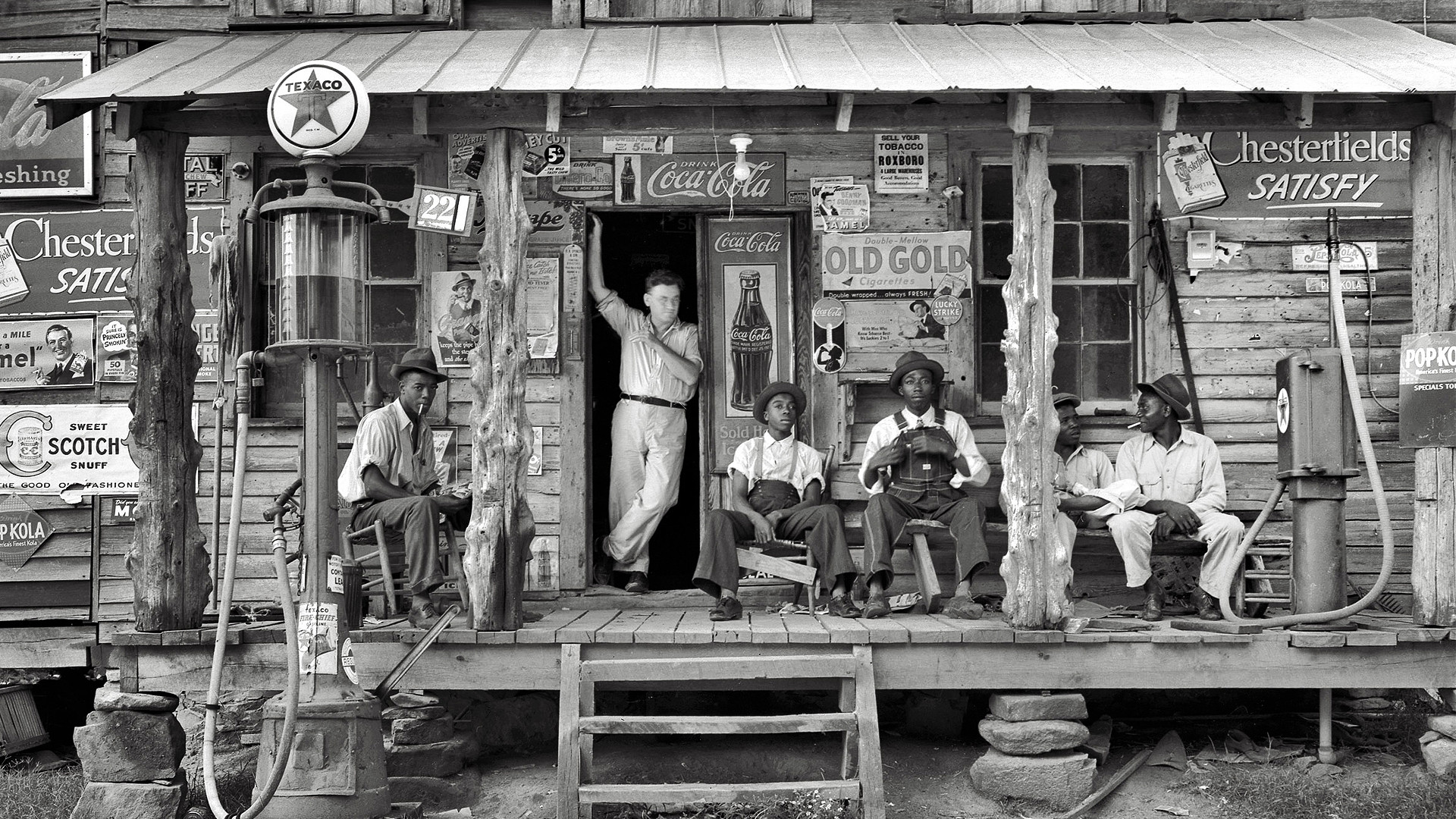 Country store on dirt road. Sunday afternoon. 1939