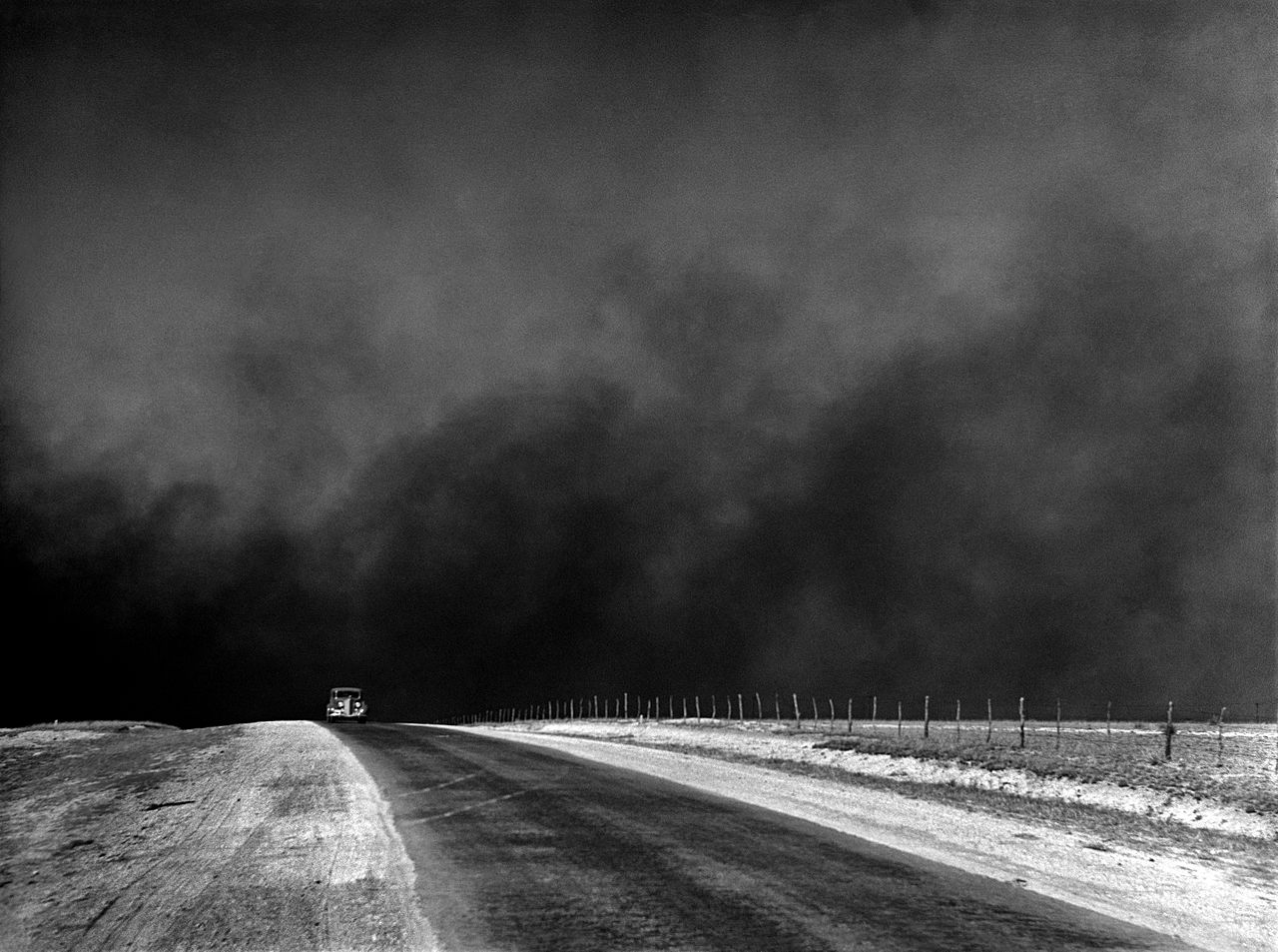A car drives through the Dust Bowl, Texas, 1936