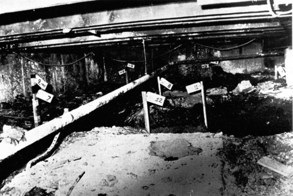 John Wayne Gacys basement. Each flag marks a boys dead body, 33 in all