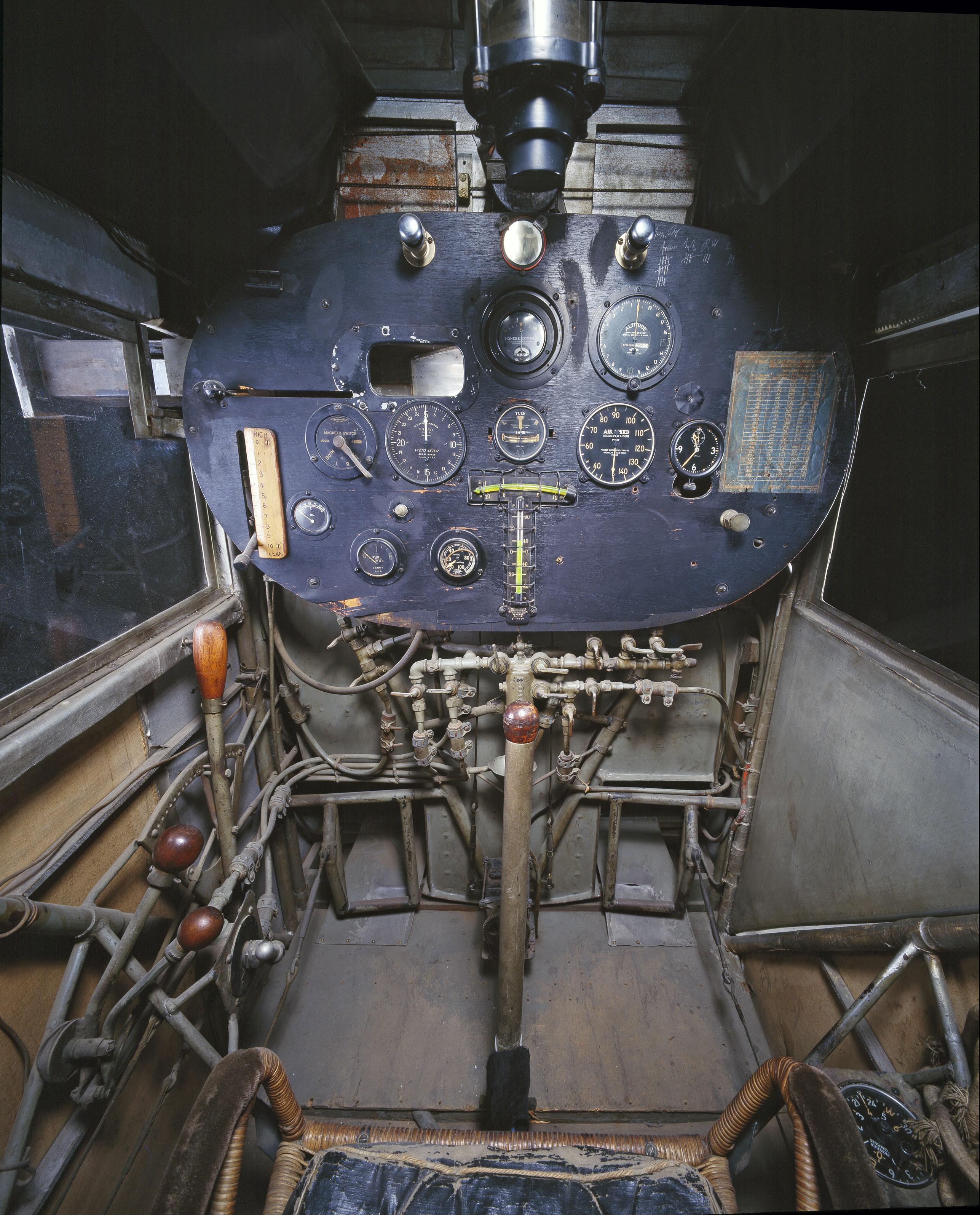 This is the cockpit of the first aircraft to make a non-stop transatlantic flight, the Spirit of Saint Louis. Note the periscope in lieu of a forward window.