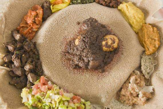 In Ethiopia, individual plates are considered wasteful. Food is always shared from a single plate without the use of cutlery, just hands.