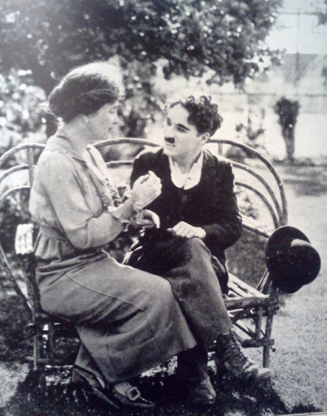 Helen Keller teaching Charlie Chaplin the manual alphabet 1919