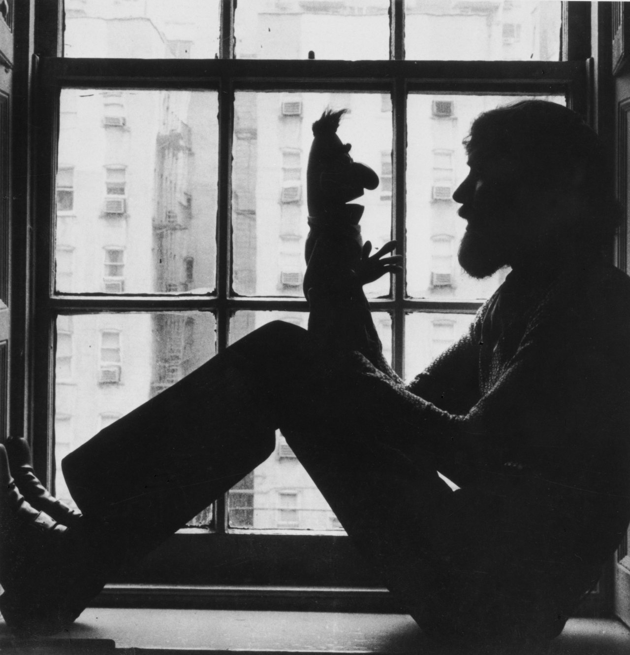 Jim Henson playing with the Bert puppet, 1971