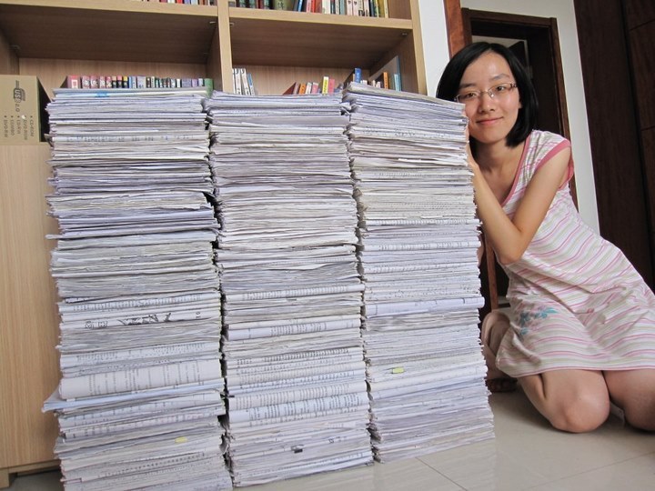 Chinese girl shows every exam paper she taken in three years high school.