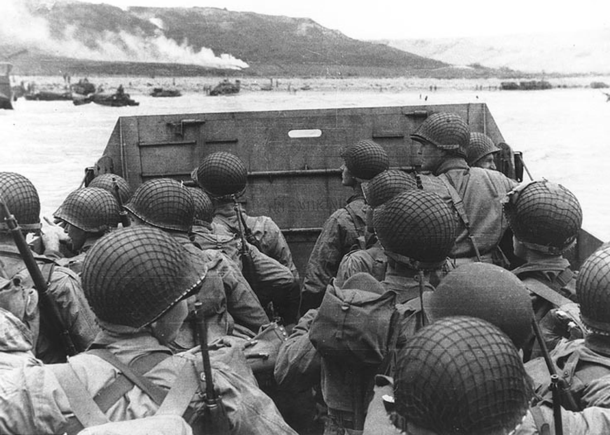 Troops in an LCVP landing craft approaching Omaha Beach, Normandy, FR. D-Day. June 6th, 1944