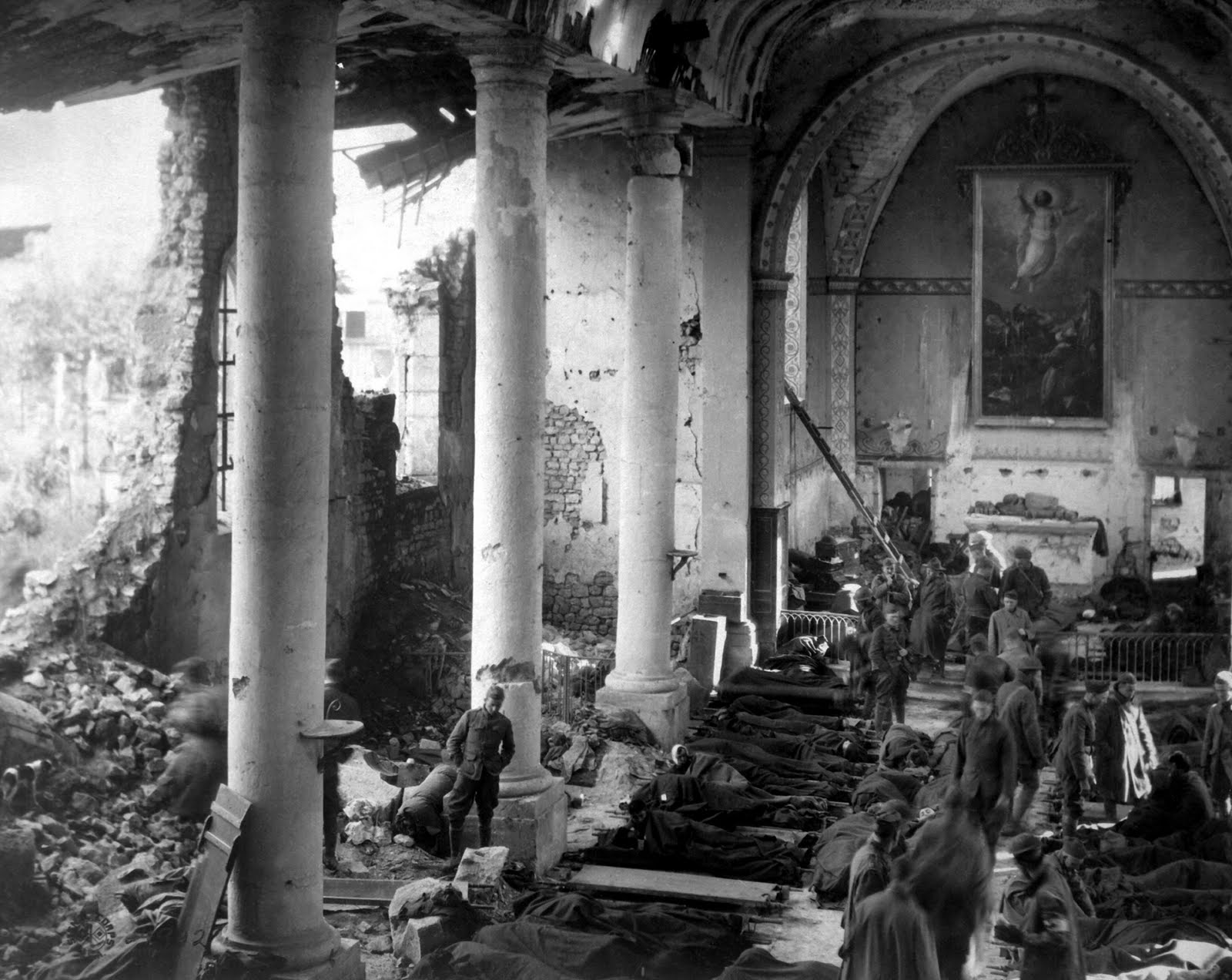 An American field hospital inside the ruins of a church in Neuvilly, France, 1918