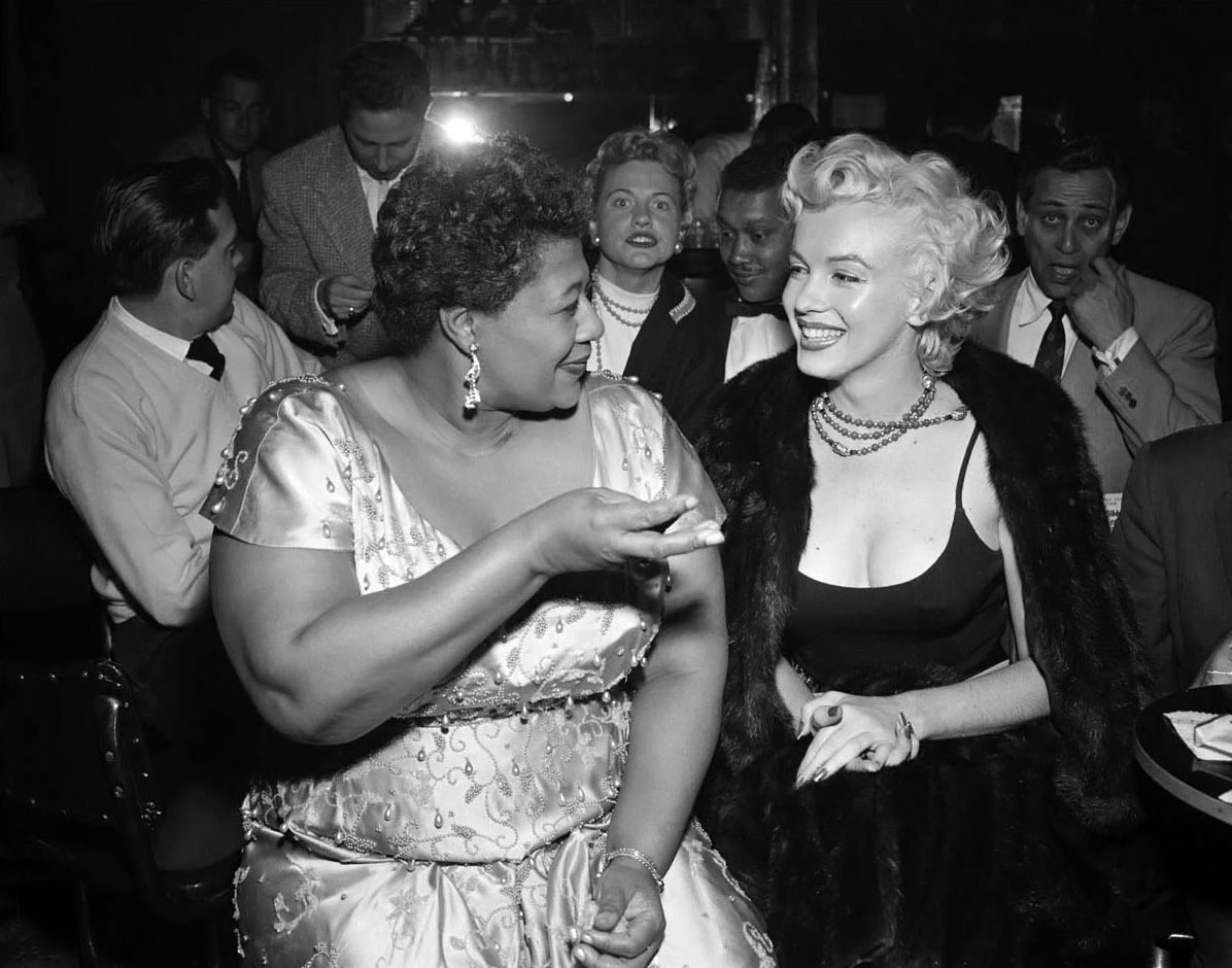 Marilyn Monroe with Ella Fitzgerald at the the Mocambo. A popular Hollywood night club at the time. That would not book Ella because of segregation. Marilyn told the manager that she would reserve a front row table every night Ella performed there. Ella performed a week later. 1955