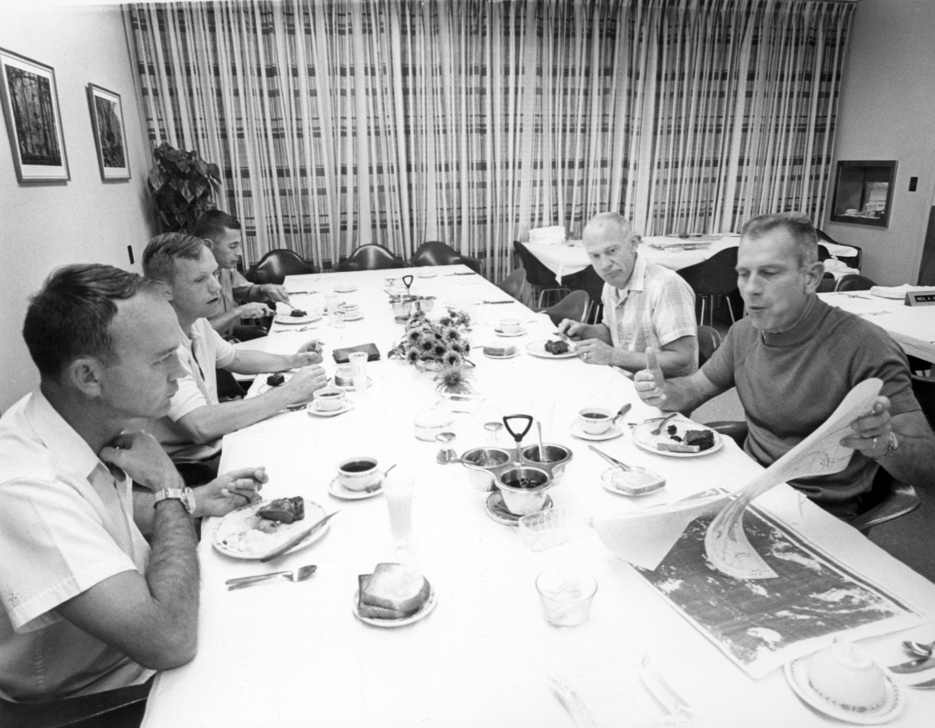 The crew of Apollo 11 enjoy the traditional steak and egg breakfast before departing for the moon, July 16 1969
