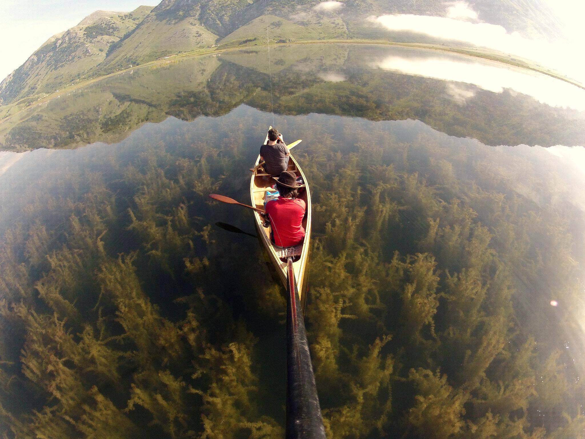 Canoeing In A Crystal Clear Lake
