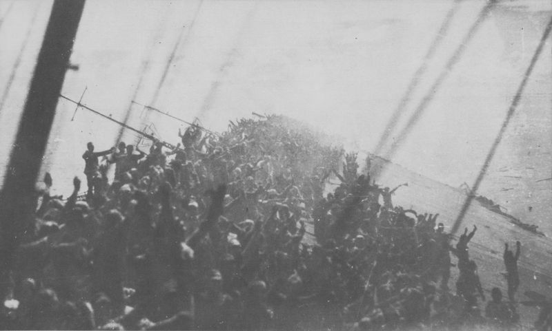 Crew of the Japanese carrier Zuikaku give one final banzai cheer before the ship sinks. 1944