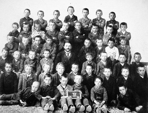 Adolf Hitler's 4th grade class, 1899. The fuhrer-to-be can be seen top row, dead center