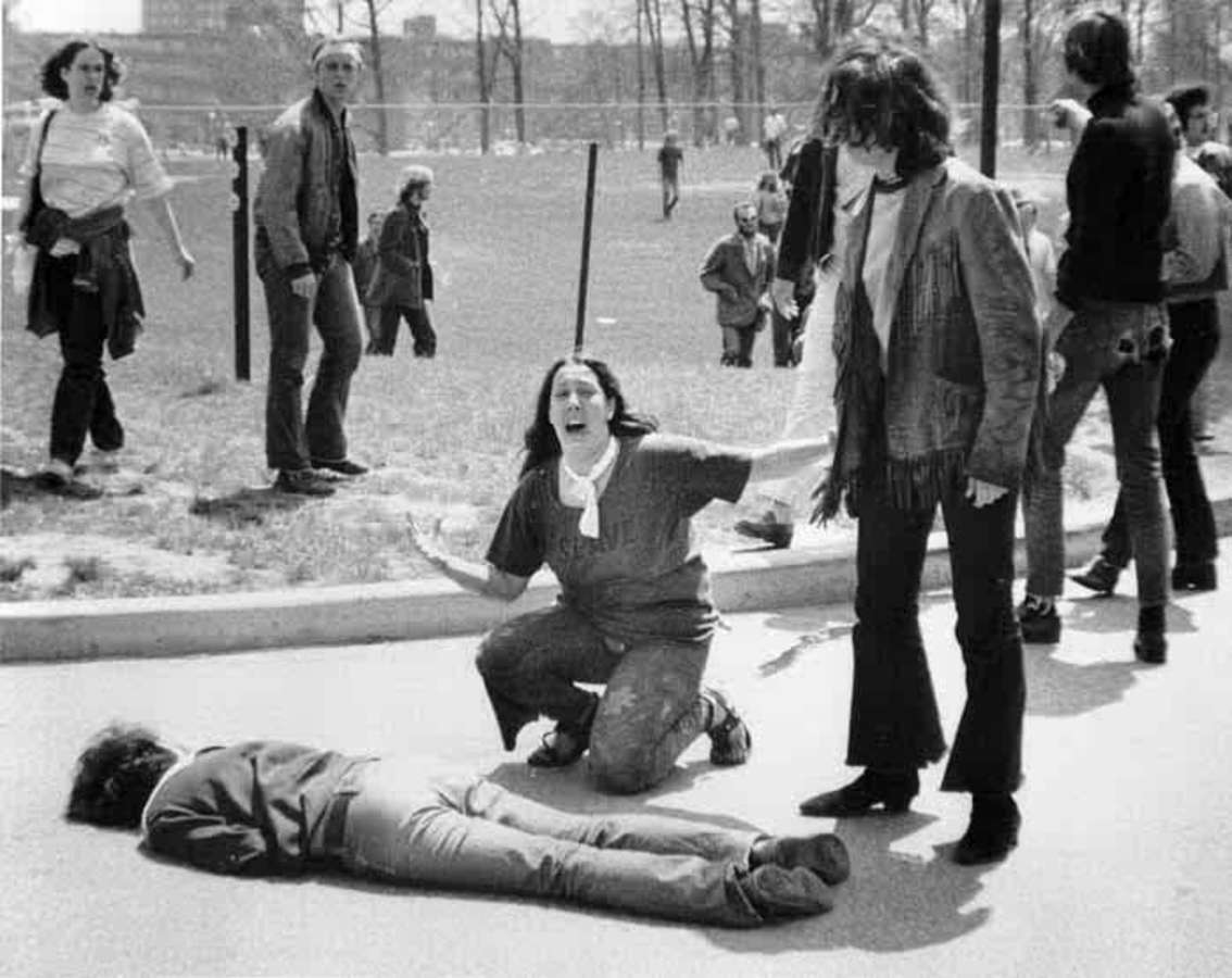 John Filo's award winning photograph of 14-year-old Mary Ann Vecchio, kneeling over the body of Jeffrey Miller, a protester shot by the Ohio State National Guard during Cambodian Invasion protests. Four students were killed, and nine were injured. Kent State