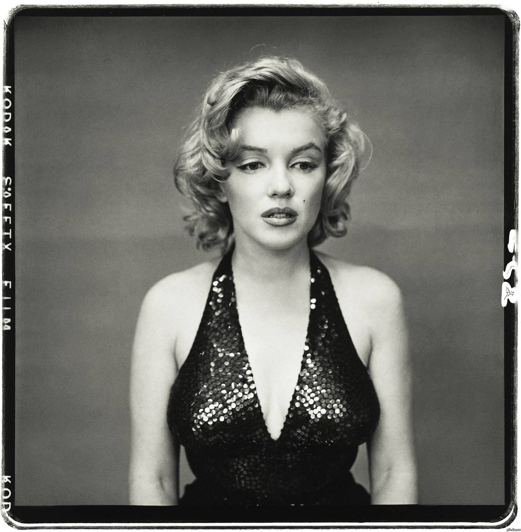 A rare picture of Marilyn Monroe without her signature smile. Photo by Richard Avedon, 1957.