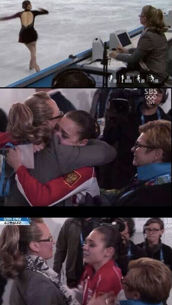 Russian Adelina Sotnikova hugging one of the Russian judges, after receiving gold.
