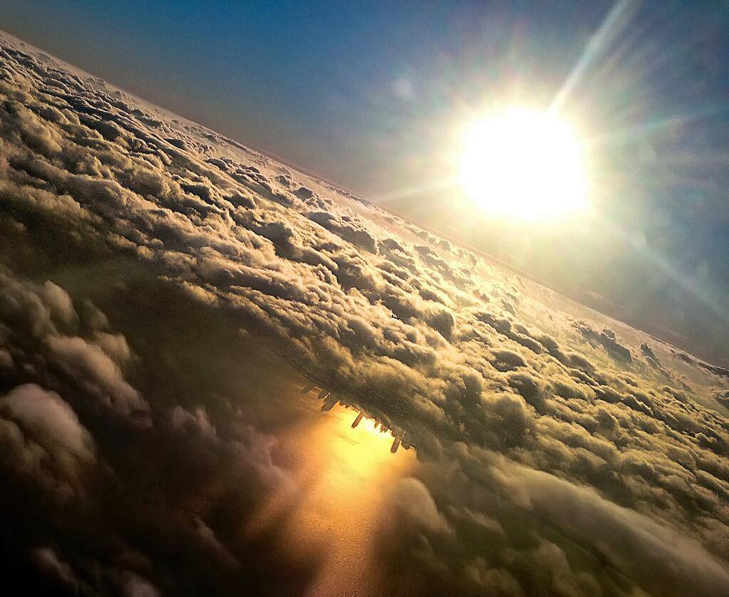 chicago reflected in lake michigan from an airplane