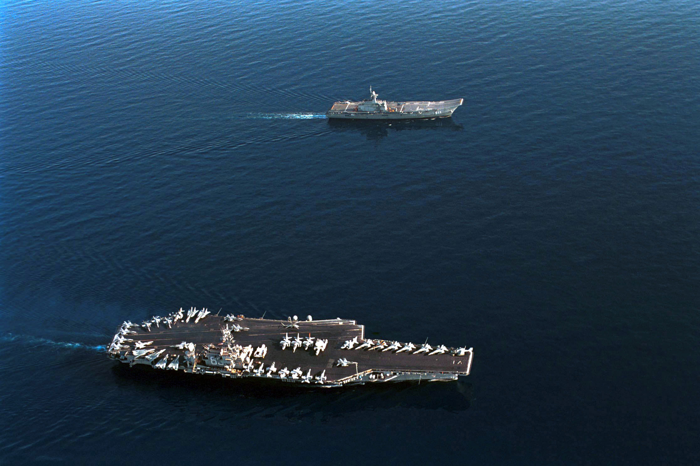 Size comparison of Thailands only aircraft carrier versus the USS Kitty Hawk