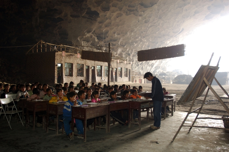 Dongzhong Cave China- It's thousands of years old, but now, this otherwise ordinary cave serves as a classroom for 186 students and eight teachers. Meaning "in cave" in Chinese, Dongzhong began its role as an educational structure in 1984 and is now one of the coolest schools around.