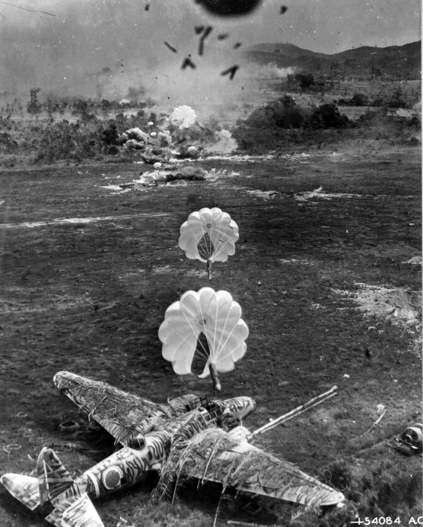 View from an American A-20 Havoc aircraft during a bomber run against a Japanese airfield, 1943-1945