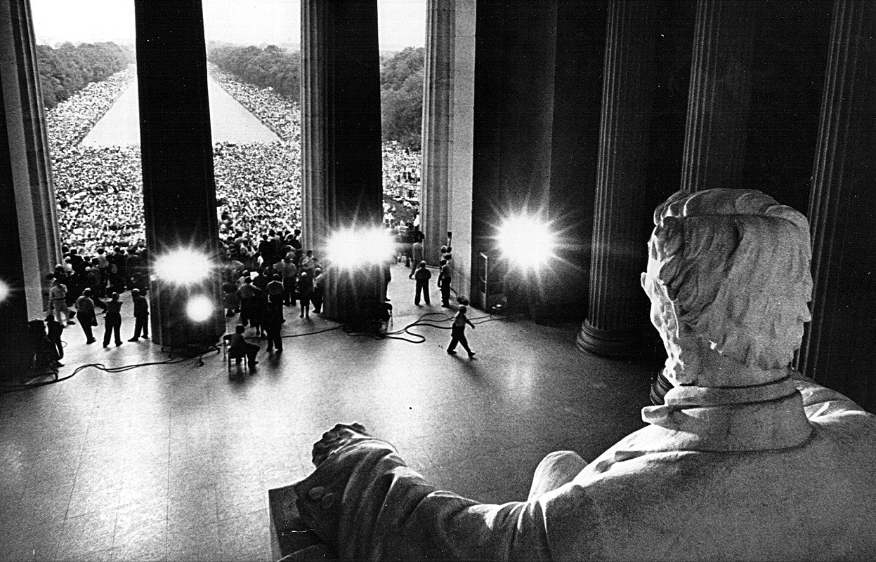 Abraham Lincoln gazes down on demonstrators, during the Civil Rights March on Washington, August 28, 1963
