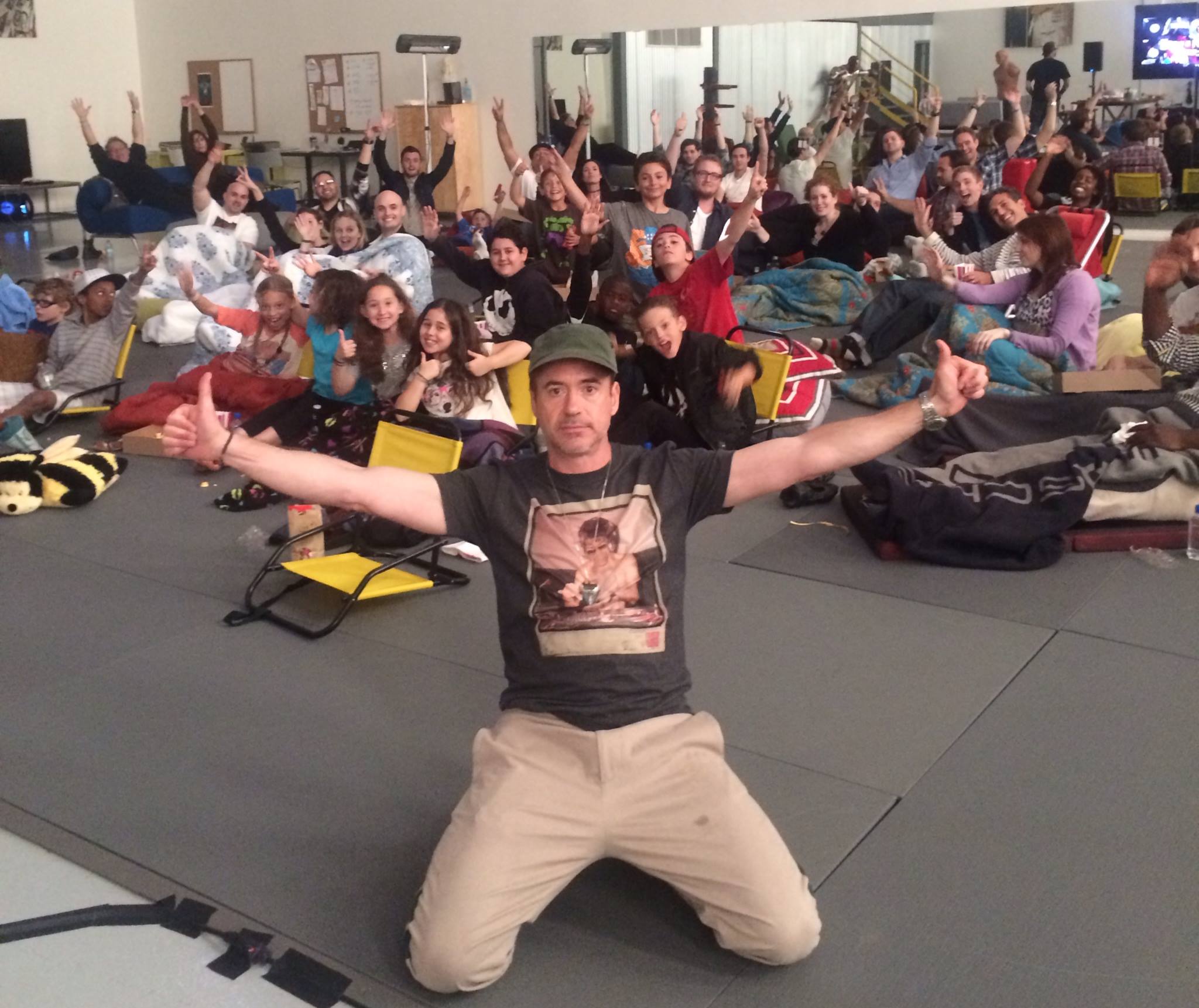 Robert Downey Jr invites a bunch of kids over to watch Captain America 2 on his Birthday.