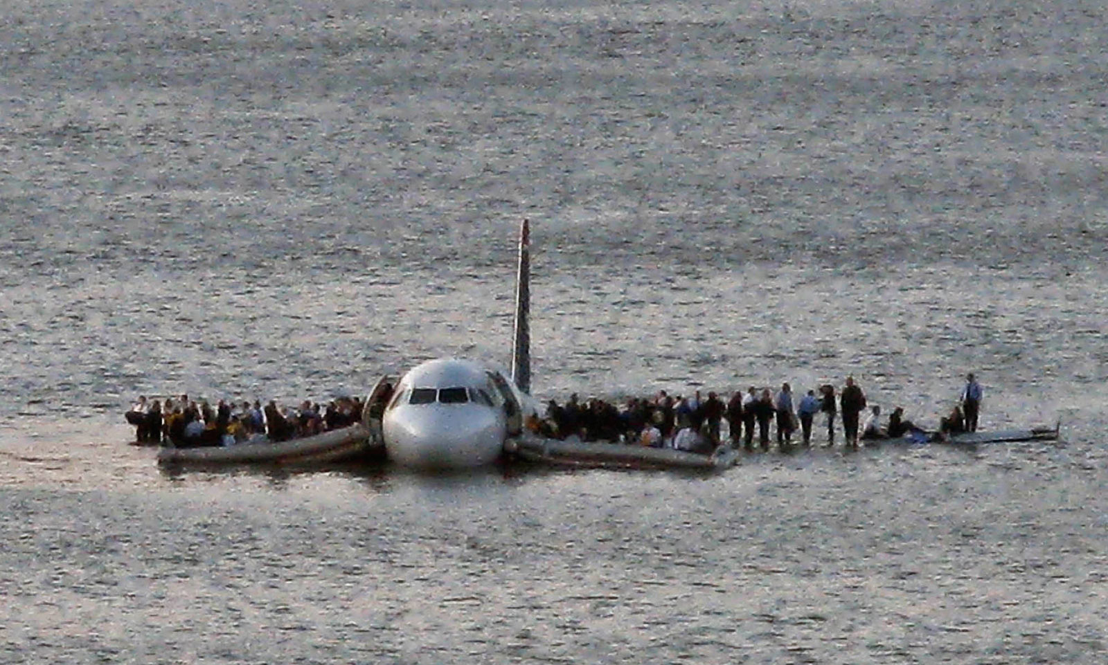 US Airways Flight 1549 floats on the Hudson river after crash landing, miraculously, everyone survived. 2009
