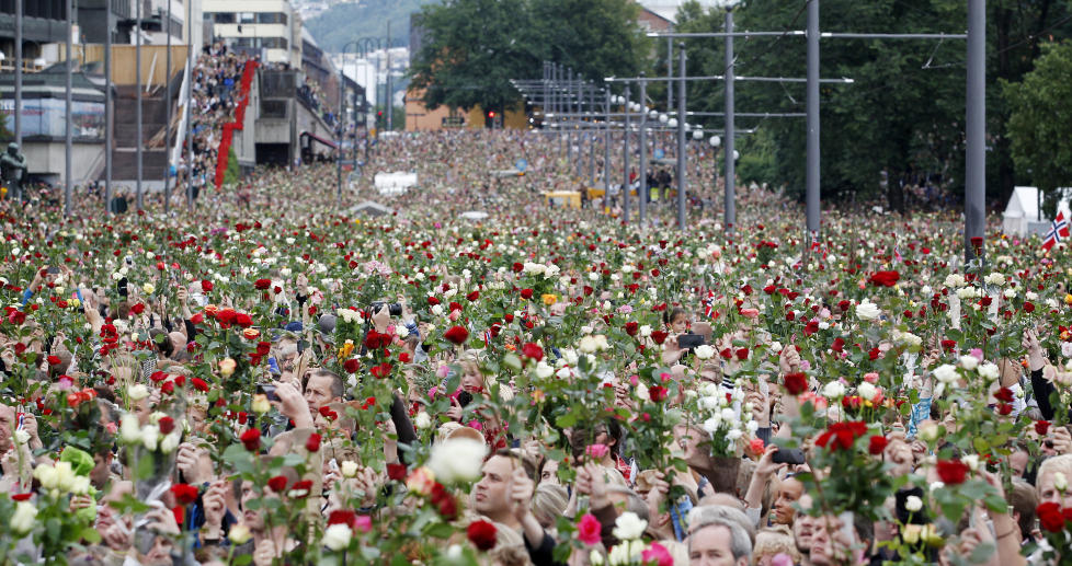 Norwegian citizens hold a flower march after the attack by Anders Breivik. 2011