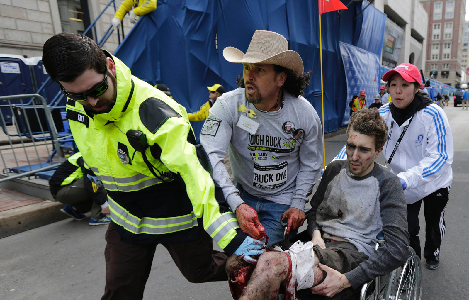 Carlos Arredondo helps Jeff Bauman after the Boston Marathon bombings. The two are now best friends. 2013