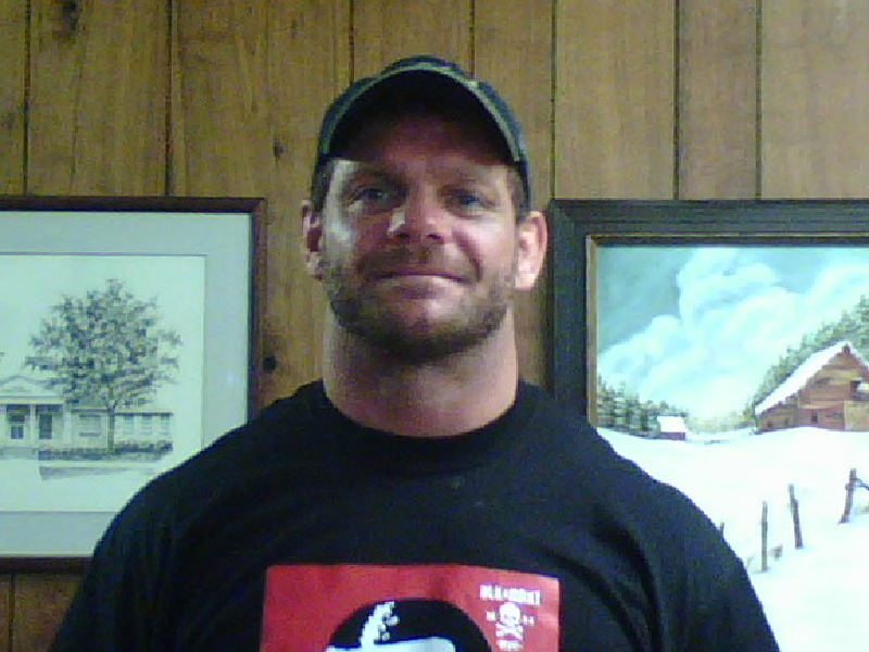 The last known photo of Chris Benoit, taken on a cell phone by a fan at Dr. Phil Astin's office on June 22nd, 2007. It was later determined that his wife was already dead by the time this photo was taken.