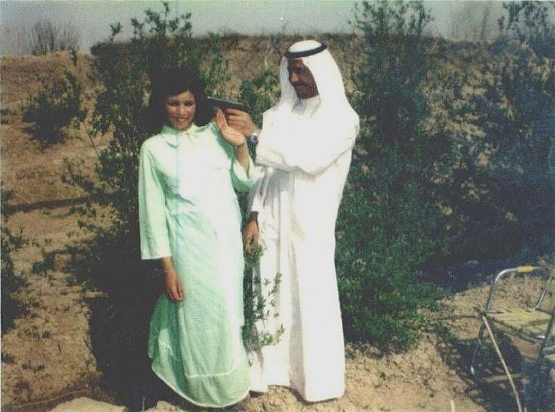 A young Saddam Hussein with his female companion