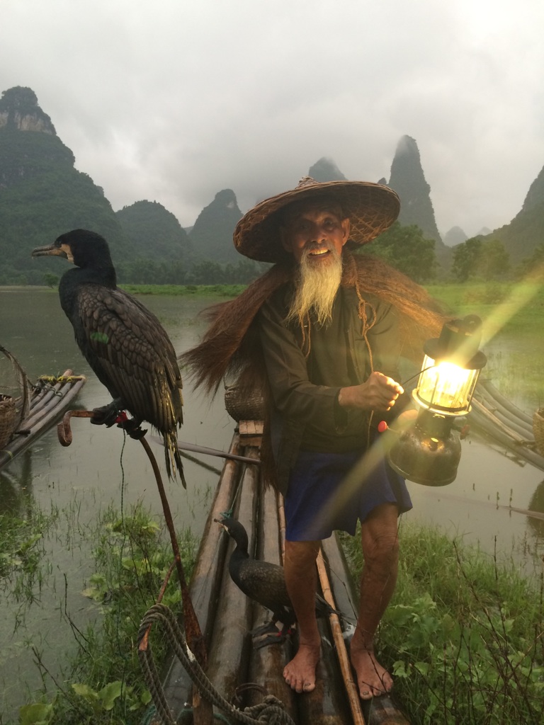A cormorant fisherman on the Li River outside of Guilin, China.
