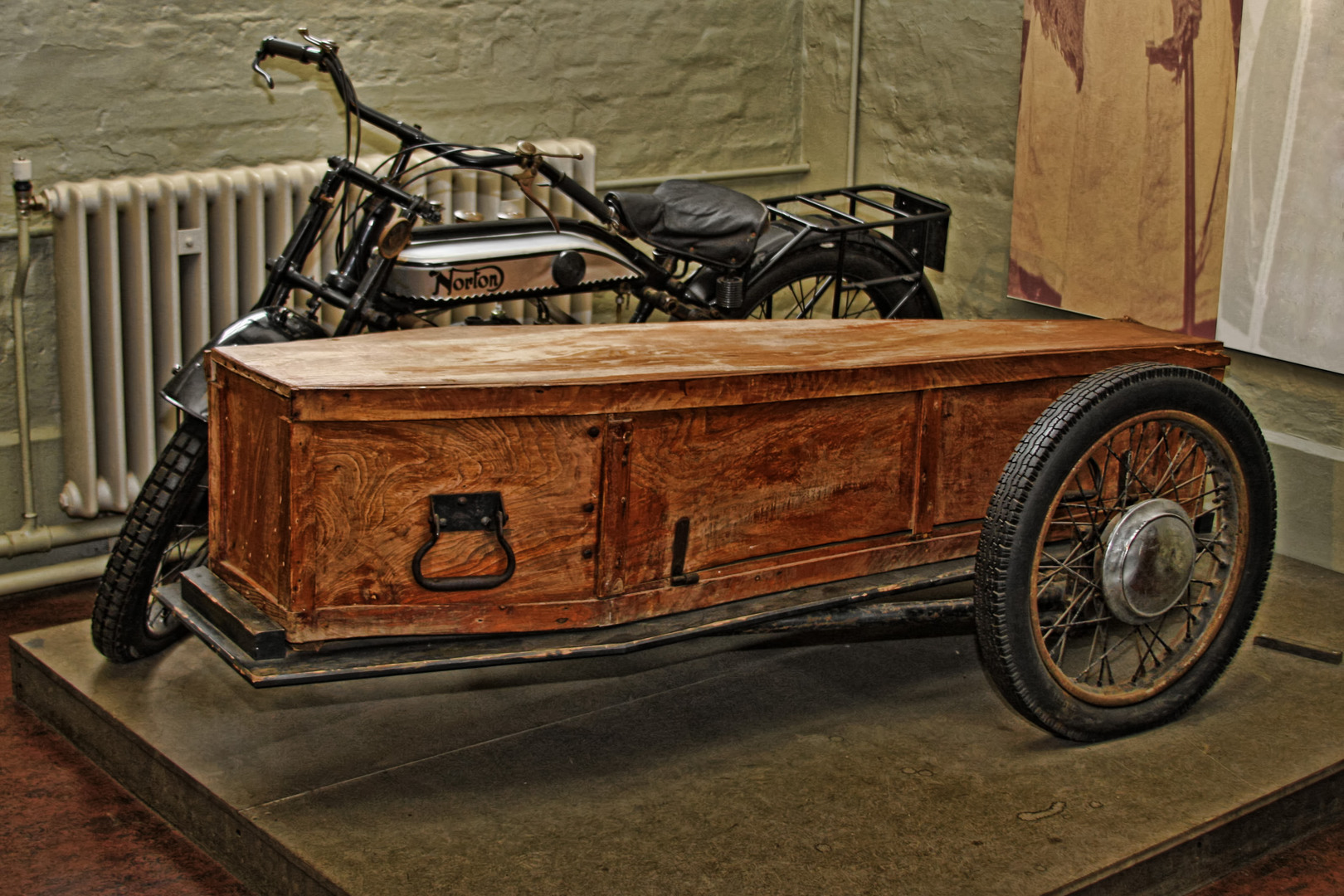 Norton Motorcycle and side coffin at the Norfolk Rural Life Museum. Possibly the oldest motorcycle hearse