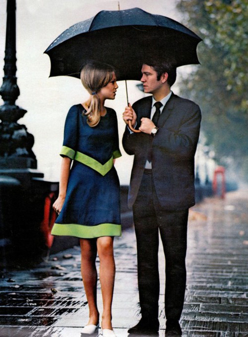 A stylish couple in the rain in London, 1963