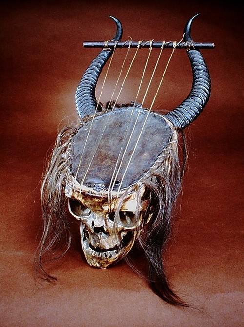 19th century lyre made of human skull, antelope horn, skin, gut and hair.