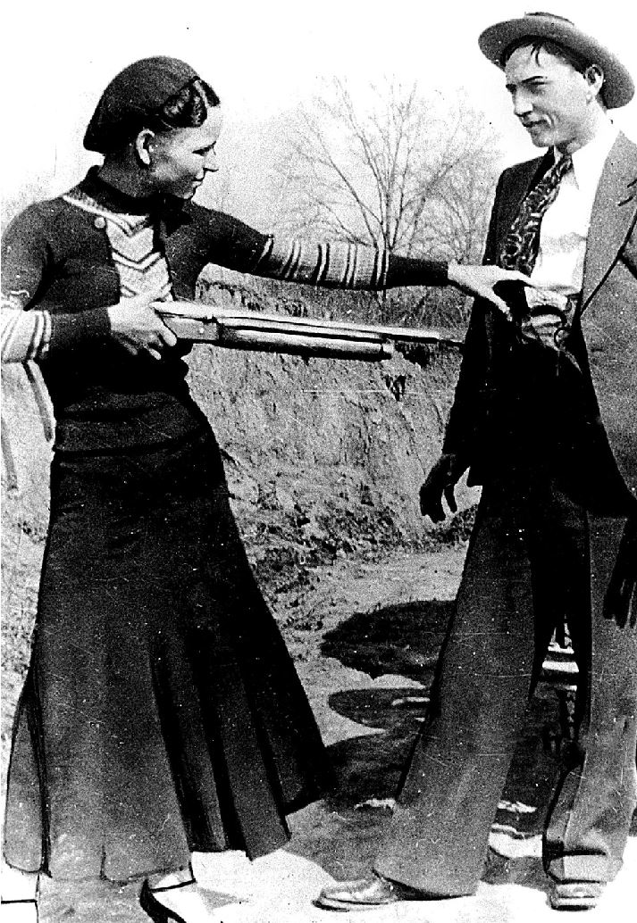 Bonnie and Clyde in a photo found at one of their hideouts after a police raid. Joplin, Missouri 1933