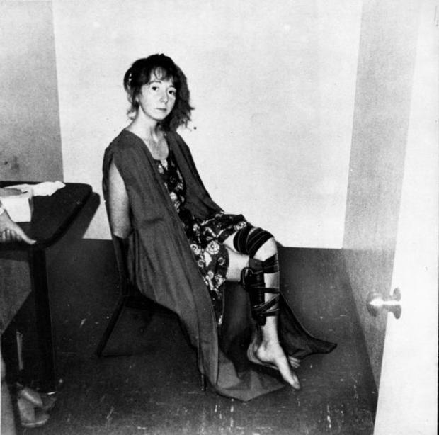 Lynette "Squeaky" Fromme sits in an interrogation room September 5, 1975, just after her assaination attempt on Gerald R. Ford