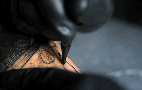 A tattoo needle in slow motion