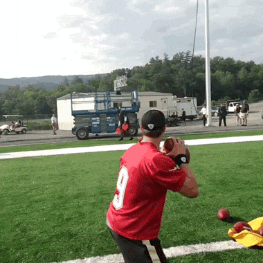 football being thrown gif